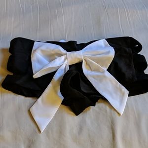 iHeartRaves White Bow shorts with cut out sides